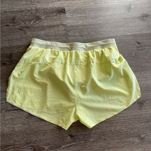 Lululemon Athletica Soft Yellow Perforated Shorts - Picture 3 of 6